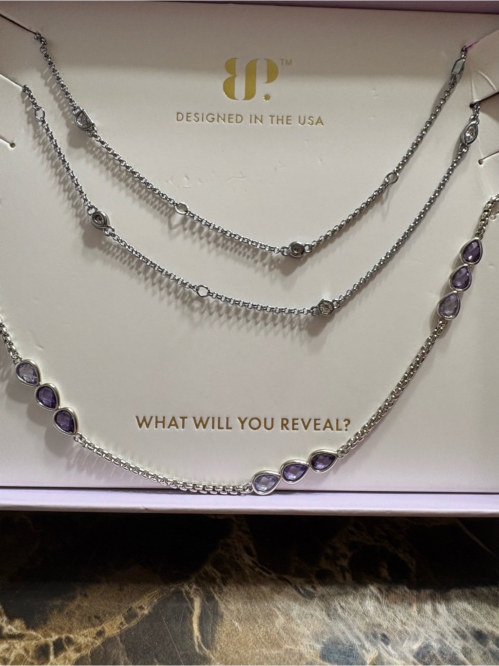BP April birthday necklace 36 in on Hematite & a luxe layer necklace on Rhodium